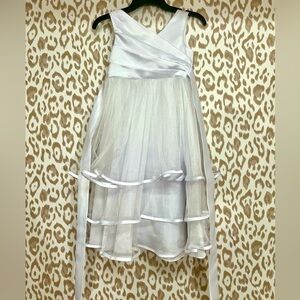 Flower Girl White Dress. Size 4. Satin trim and top. Tulle skirt. Worn once